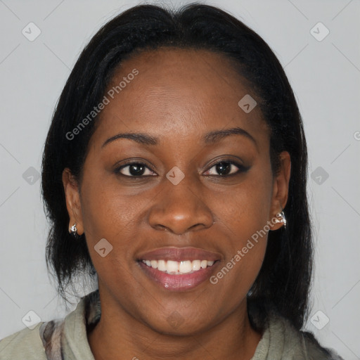 Joyful black young-adult female with medium  brown hair and brown eyes