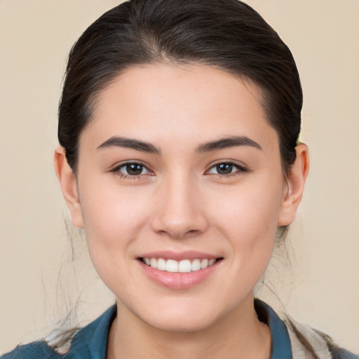 Joyful white young-adult female with medium  brown hair and brown eyes