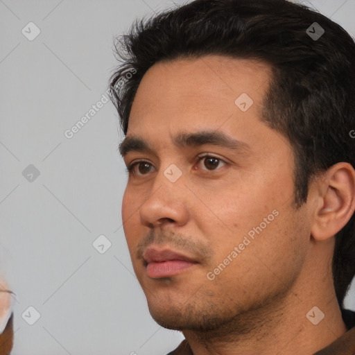 Neutral white young-adult male with short  black hair and brown eyes