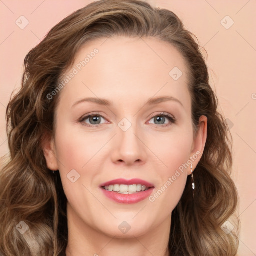 Joyful white young-adult female with long  brown hair and blue eyes