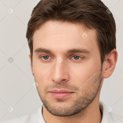 Neutral white young-adult male with short  brown hair and brown eyes