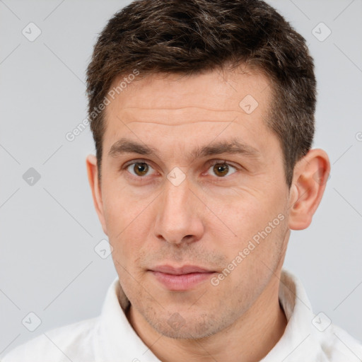 Neutral white adult male with short  brown hair and brown eyes