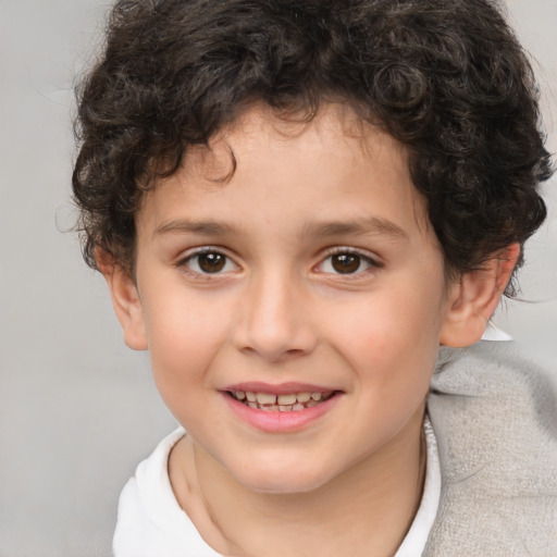 Joyful white child female with short  brown hair and brown eyes