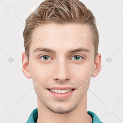 Joyful white young-adult male with short  brown hair and grey eyes