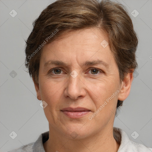 Joyful white adult male with short  brown hair and grey eyes