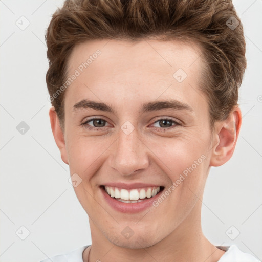 Joyful white young-adult female with short  brown hair and grey eyes