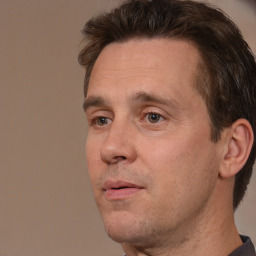 Neutral white adult male with short  brown hair and brown eyes