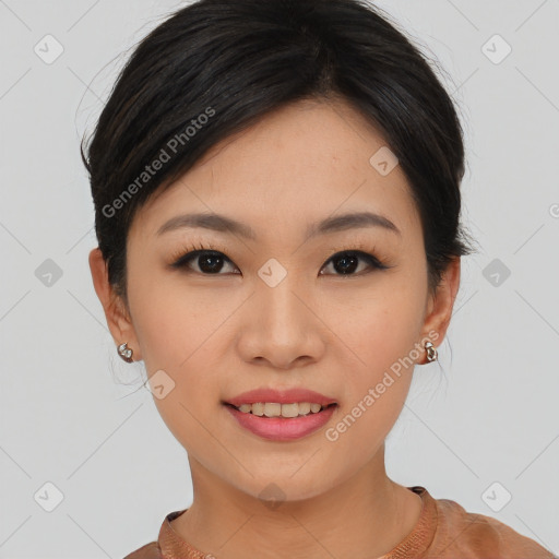 Joyful asian young-adult female with medium  black hair and brown eyes