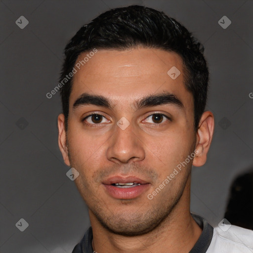 Joyful white young-adult male with short  black hair and brown eyes