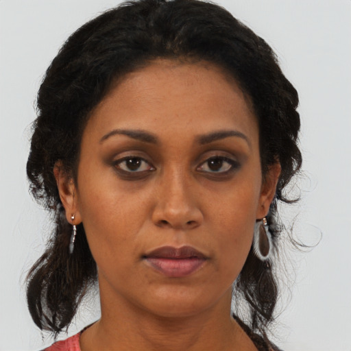Neutral black young-adult female with medium  black hair and brown eyes