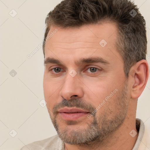 Neutral white adult male with short  brown hair and brown eyes