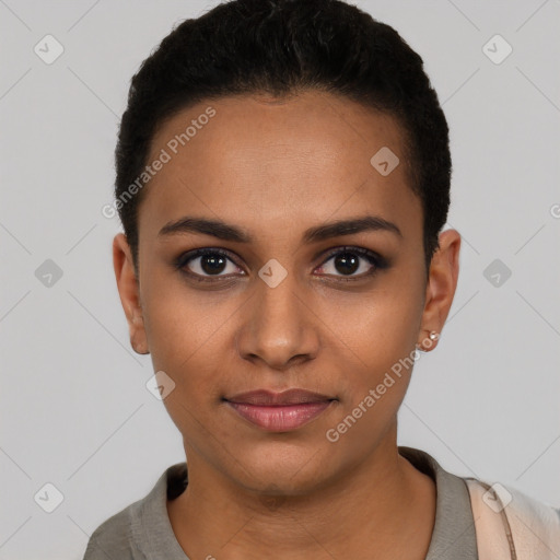 Joyful latino young-adult female with short  black hair and brown eyes