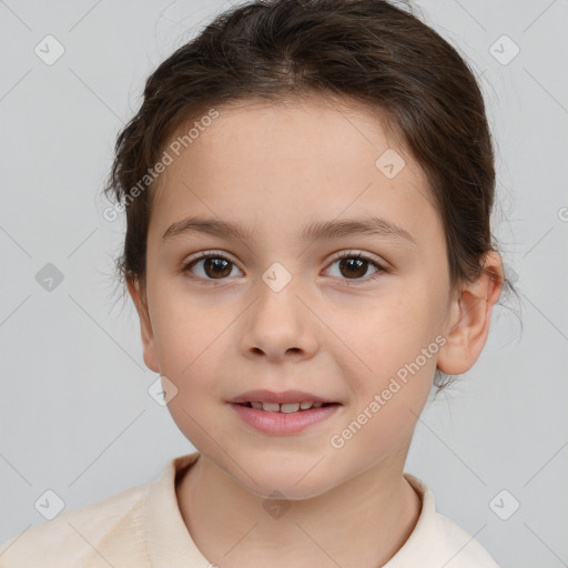 Joyful white child female with short  brown hair and brown eyes
