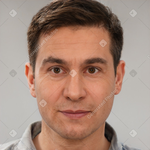 Joyful white adult male with short  brown hair and brown eyes