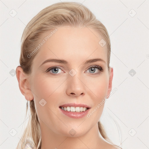 Joyful white young-adult female with long  brown hair and blue eyes