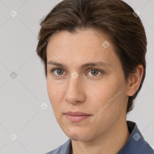 Neutral white young-adult female with short  brown hair and brown eyes