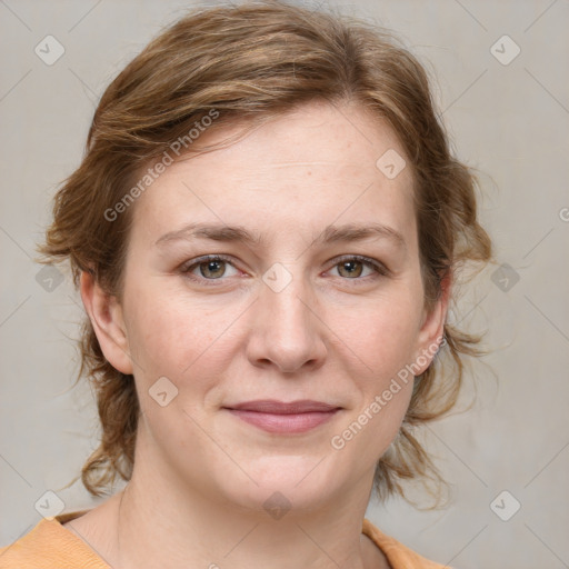 Joyful white young-adult female with medium  brown hair and blue eyes