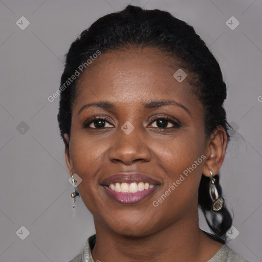 Joyful black young-adult female with medium  black hair and brown eyes