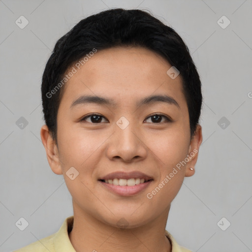 Joyful asian young-adult male with short  black hair and brown eyes