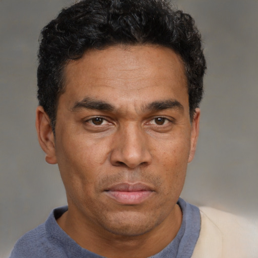 Neutral white adult male with short  black hair and brown eyes