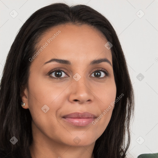 Joyful latino young-adult female with long  brown hair and brown eyes