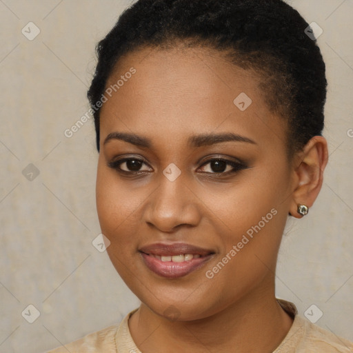 Joyful black young-adult female with short  brown hair and brown eyes