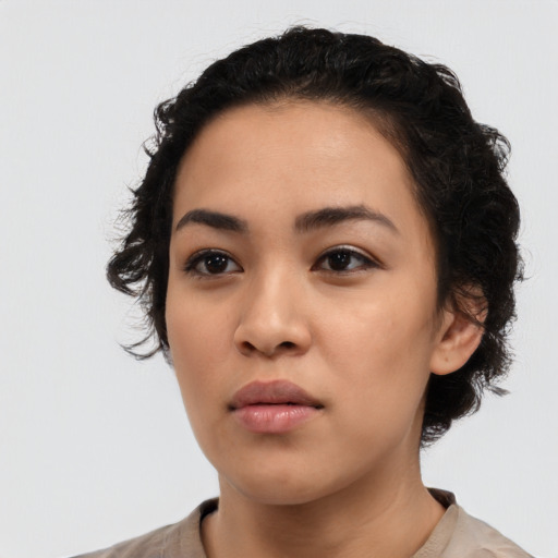 Neutral latino young-adult female with medium  black hair and brown eyes