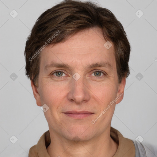 Joyful white adult male with short  brown hair and grey eyes