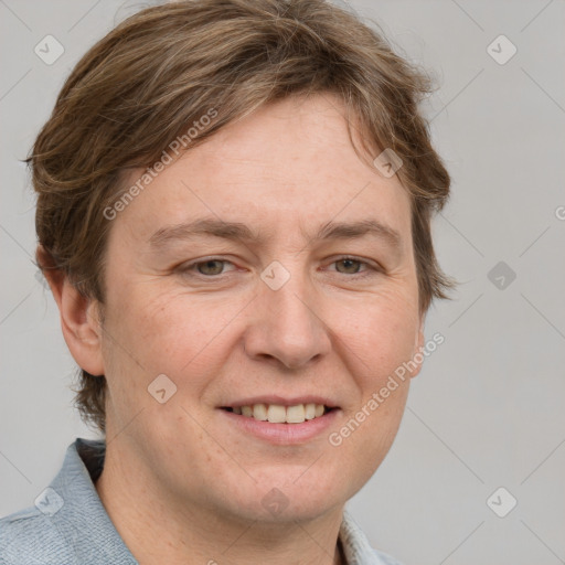 Joyful white adult female with short  brown hair and grey eyes