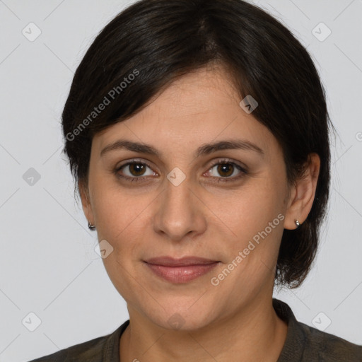 Joyful white adult female with medium  brown hair and brown eyes