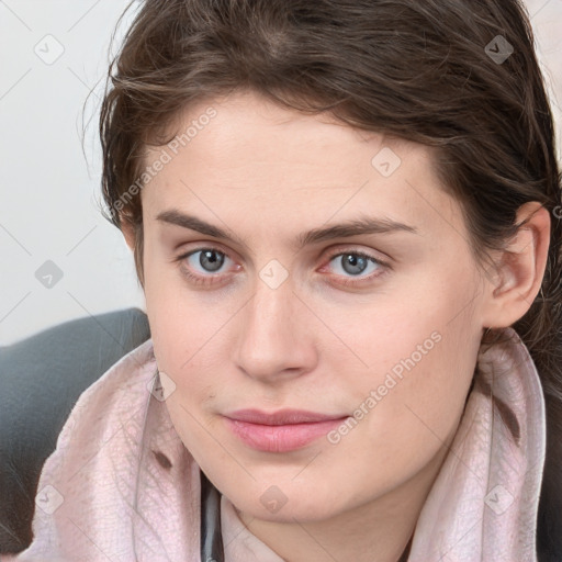 Neutral white young-adult female with medium  brown hair and grey eyes