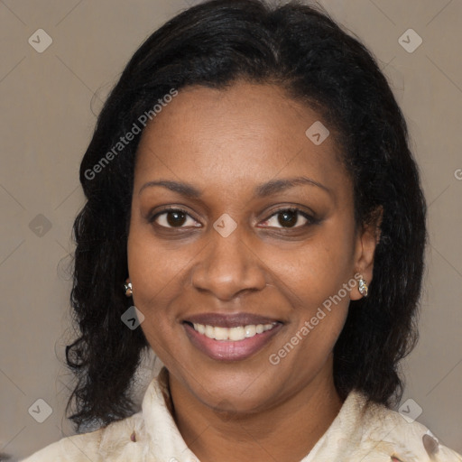 Joyful black young-adult female with medium  brown hair and brown eyes