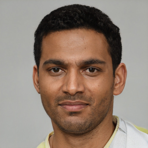 Neutral black young-adult male with short  black hair and brown eyes