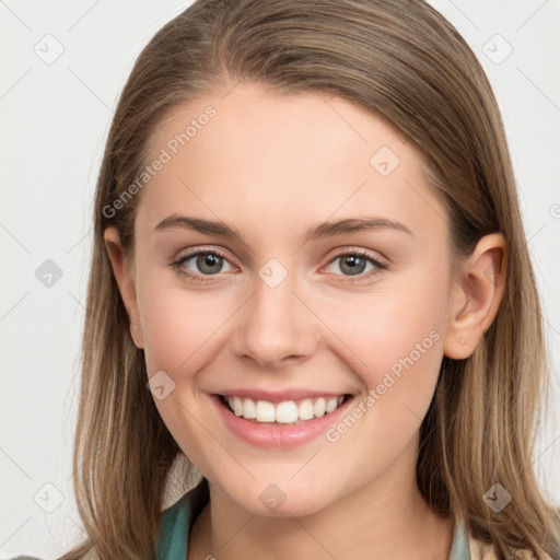 Joyful white young-adult female with long  brown hair and grey eyes