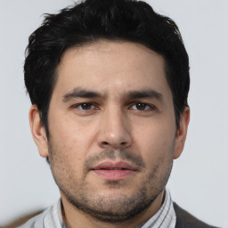 Neutral white young-adult male with short  black hair and brown eyes