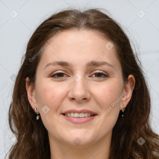 Joyful white adult female with long  brown hair and brown eyes