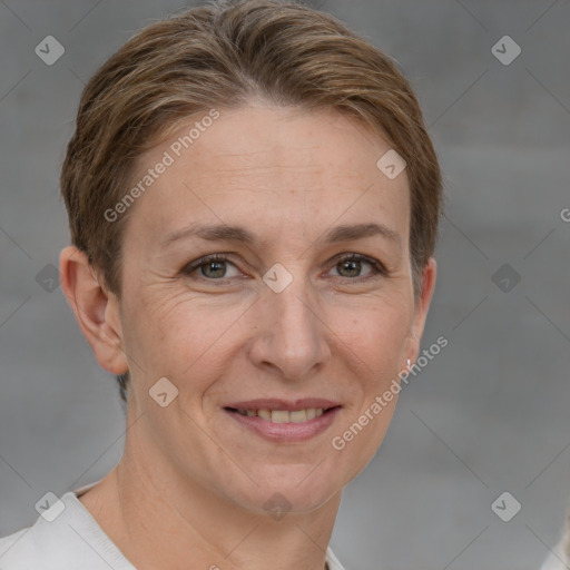 Joyful white adult female with short  brown hair and grey eyes