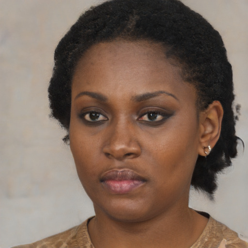 Neutral black young-adult female with short  black hair and brown eyes