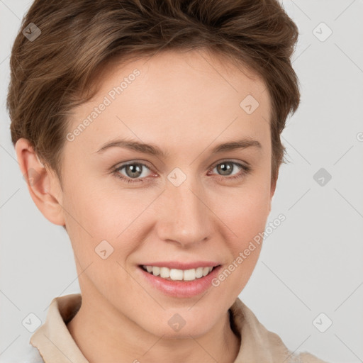 Joyful white young-adult female with short  brown hair and grey eyes