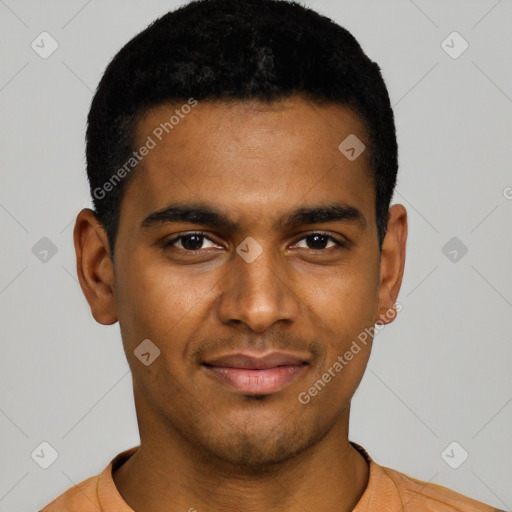 Joyful black young-adult male with short  black hair and brown eyes