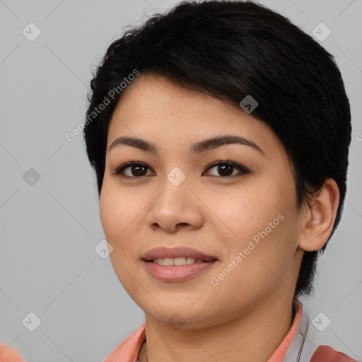 Joyful asian young-adult female with short  black hair and brown eyes