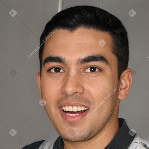 Joyful white young-adult male with short  black hair and brown eyes