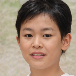 Joyful white child female with short  brown hair and brown eyes