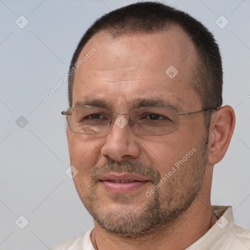 Joyful white adult male with short  brown hair and brown eyes