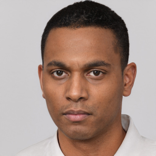 Neutral black young-adult male with short  black hair and brown eyes