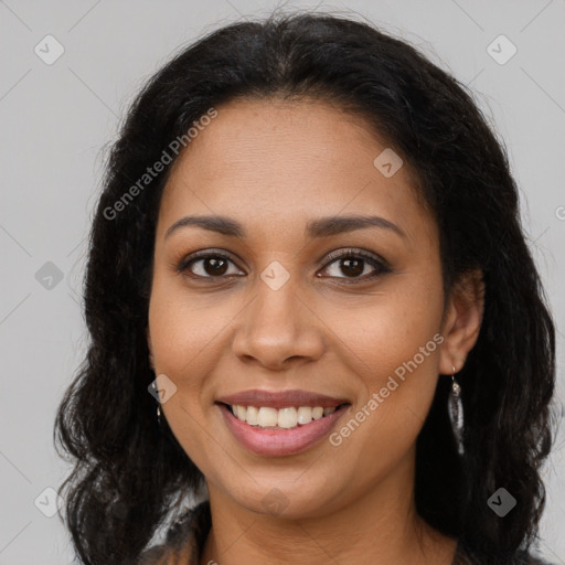 Joyful latino young-adult female with long  brown hair and brown eyes