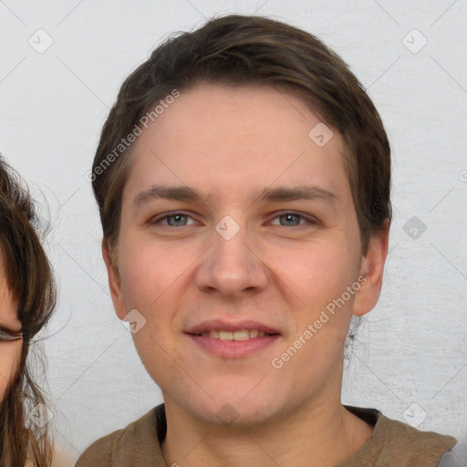 Joyful white young-adult female with short  brown hair and brown eyes