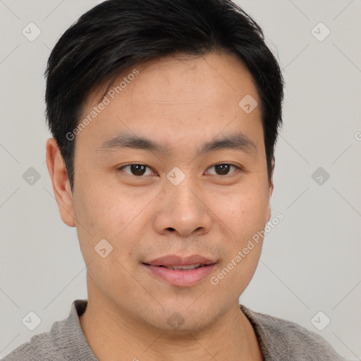 Joyful white young-adult male with short  black hair and brown eyes