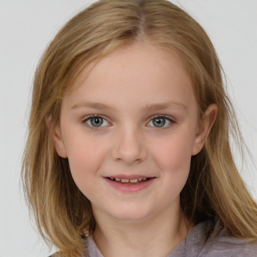 Joyful white child female with medium  brown hair and brown eyes