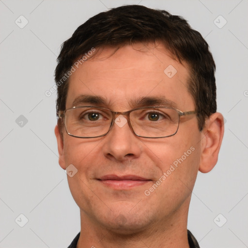 Joyful white adult male with short  brown hair and grey eyes